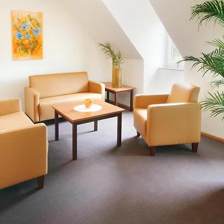 Gaestehaus Am Schloss アパートホテル