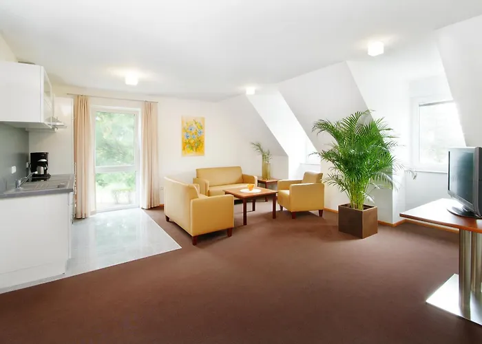 Gaestehaus Am Schloss アパートホテル